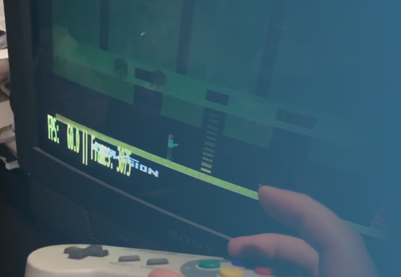 CRT monitor and gamepad used to illustrate next-frame input timing
